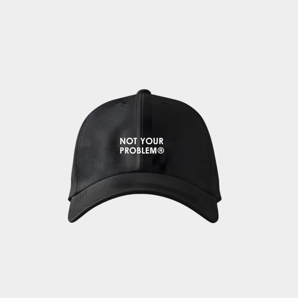 Not Your Problem® Cap – Black
