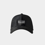 Not Your Problem® Cap – Black