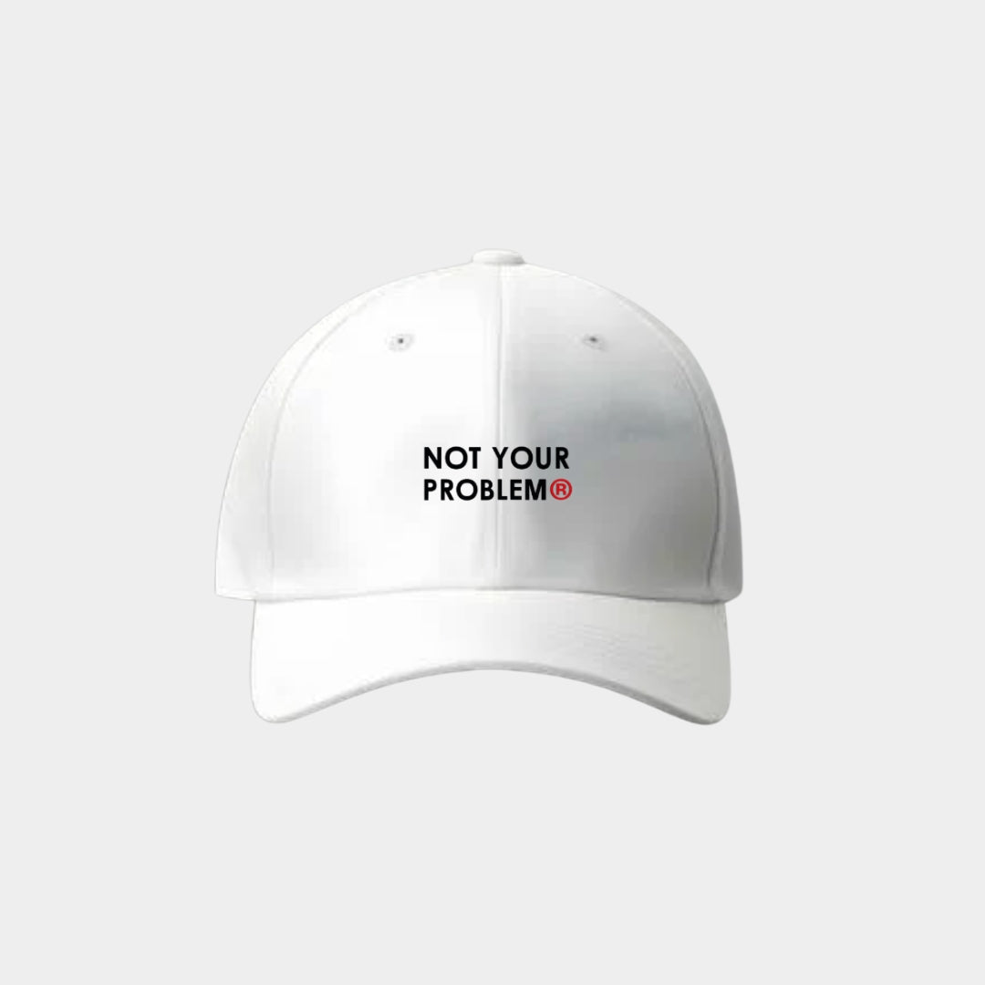 Not Your Problem® Cap – White
