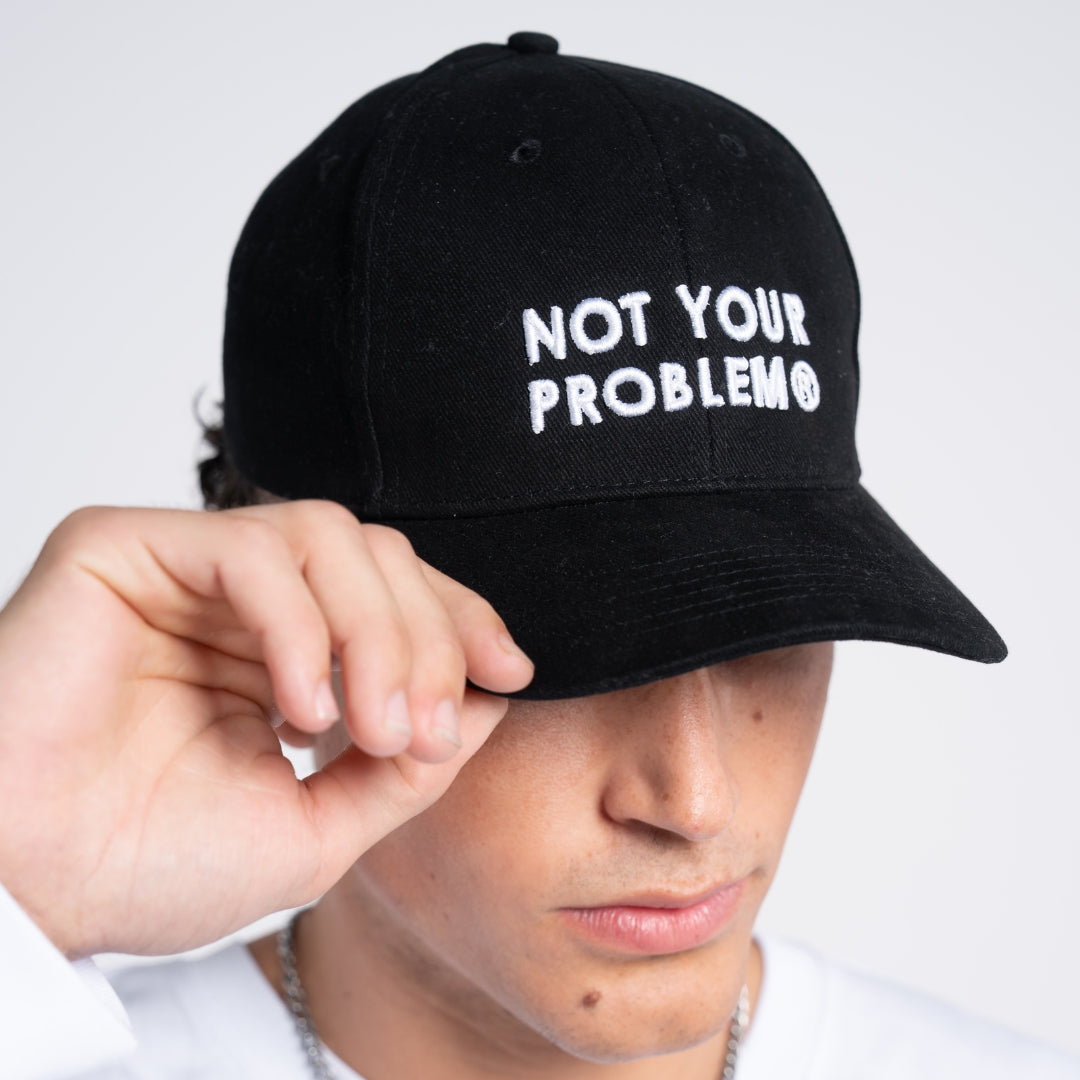 Not Your Problem® Cap – Black