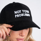Not Your Problem® Cap – Black